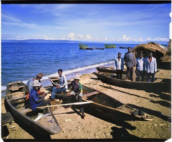 Burundi, Rumonge Province, group of fishermen on Lake Tanganyika, fishermen are exclusively Hutu and come down from the  hills to settle in temporary huts for at least 6 months, fishing is generally done at night with lampara and it's mainly ndagalas (fried fish) mukekes and Lates niloticus, in the background we perceives the tip of Burton and Speke located in the Congo (4x5 reversal film reproduction)