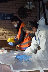 France, Bas-Rhin, Schiltigheim, intervention of two engineers from the National Agency for the Management of Radioactive Waste (Andra) in a private home to remove radioactivity from a rare model of a century-old radium fountain, disassembly of the object under plastic to avoid any contamination