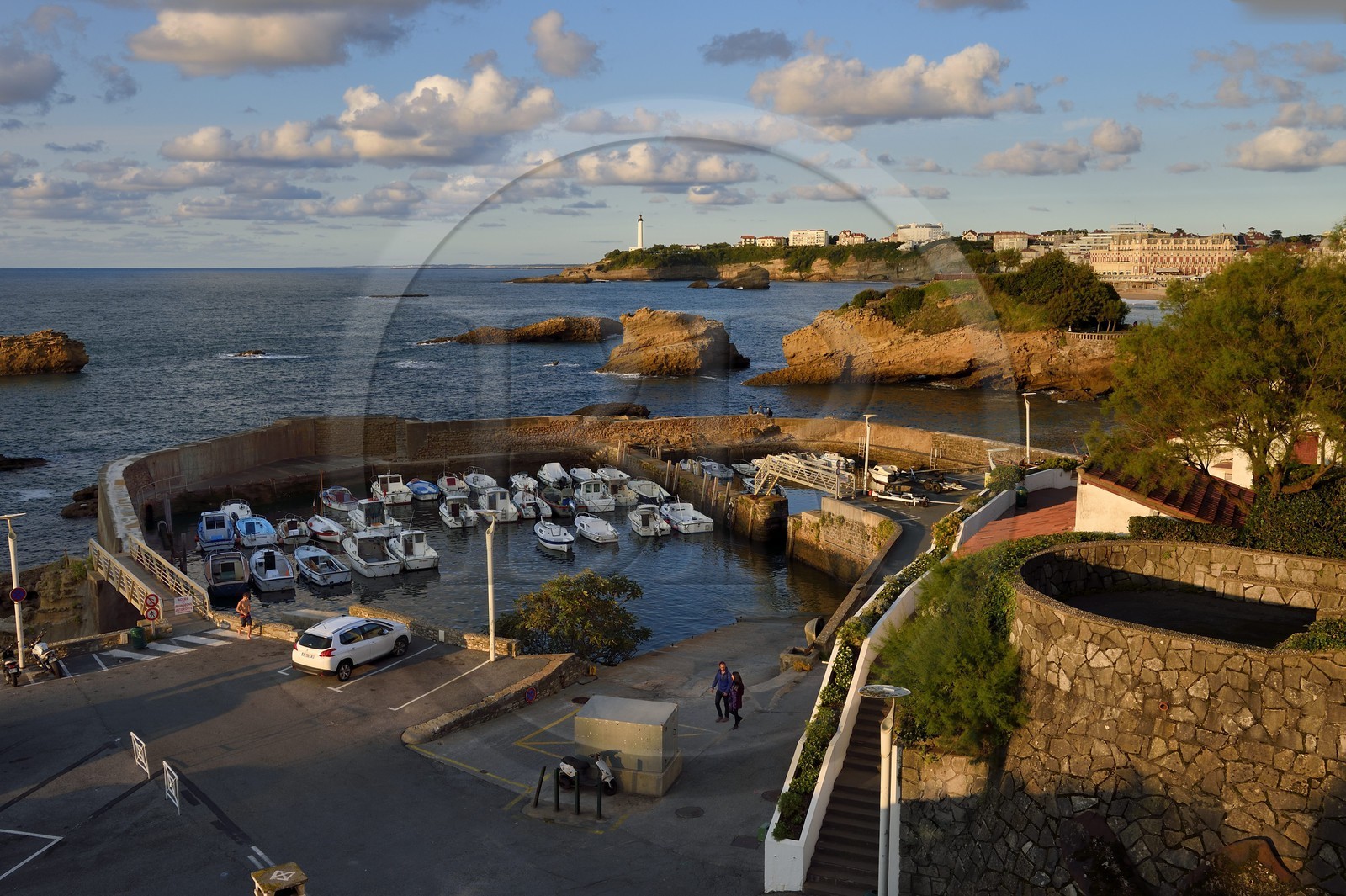France, Pyrenees Atlantiques, Basque Country, Biarritz, Port des Pecheurs, the lighthouse and the Hotel du Palais located on Grande Plage (Great beach) in the background