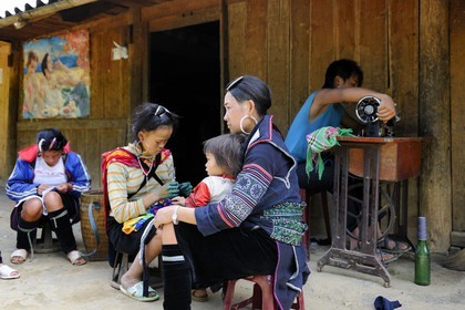 Vietnam, Lao Cai province, Sapa district, the Black Hmong minority group, sewing and blue indigo dyeing work