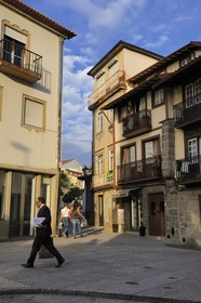 Portugal, Minho region, Guimaraes, town listed as World Heritage by UNESCO, passage towards the Largo dos Laranjais square