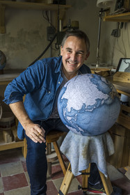 France, Charente, Cognac, Gabriel Gaborel, creator of OrbisTerrae, manufactures handcrafted terrestrial globes painted in watercolor