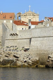 Croatia, Dalmatia, Dalmatian coast, Dubrovnik, Historic Centre listed as World Heritage by UNESCO, the ramparts on the sea side and the Church of Saint Ignatius in the background