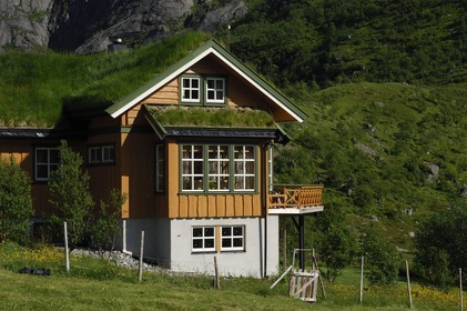 Norway, Nordland County, Lofoten Islands, Flakstad island, wooden house with a gras roof