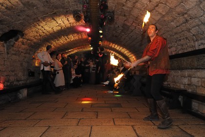 France, Paris, the Saint-Sabin cellars, medieval tavern, juggling with fire