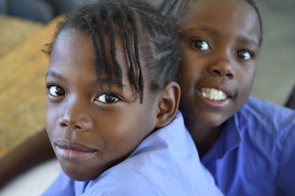Namibia, Erongo region, Damaraland, the Spitzkoppe in the Namib Desert, Katora Primary School, young girls in the grade 4 classroom (around 11 years)