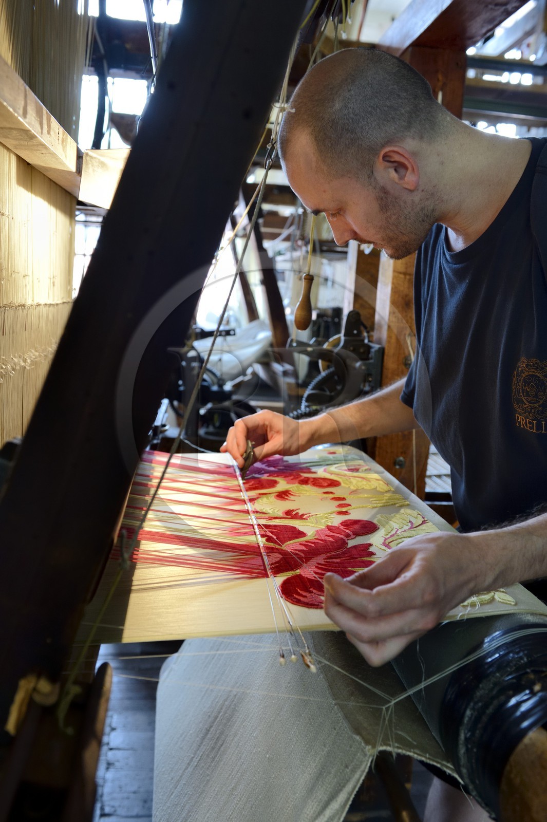 France, Rhone, Lyon, La Croix Rousse District, Silk manufacturer Prelle, silk loom developed by Joseph Marie Jacquard called Jacquard loom, the canut (lyonnais silk worker) Sebastien