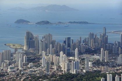 Panama, Panama City skyscrapers the Causeway Islands (Calzada de Amador) in the background (aerial view)