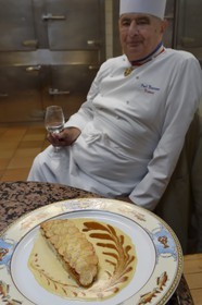 France, Rhone, Collonges au Mont d'Or, Paul Bocuse Restaurant L'Auberge du Pont de Collonges, three Michelin stars since 1965, famous French chef Paul Bocuse, red mullet dressed in crusty potato scales