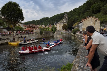 France, Dordogne, Brantome, water jousting on the Dronne river and Saint Pierre benedictine abbey
