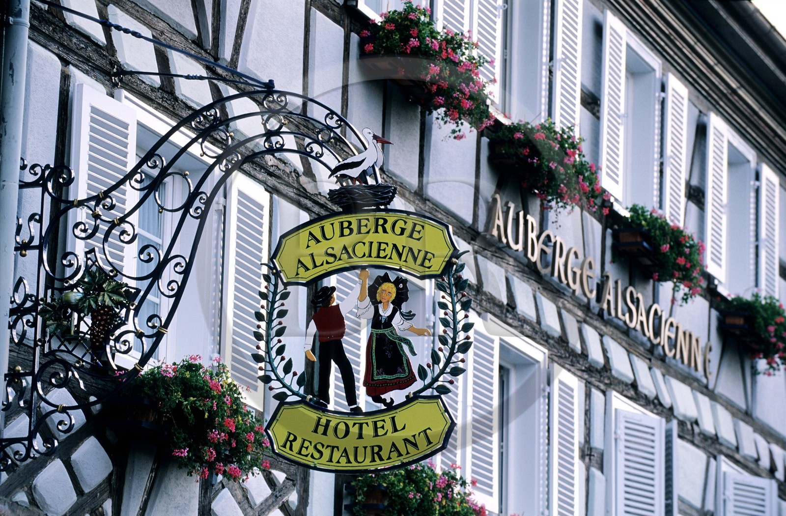 France, Haut Rhin, Eguisheim village, labelled Les Plus Beaux Villages de France (The Most Beautiful Villages of France), sign for a hotel restaurant