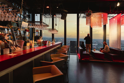 Switzerland, Basel, Bar Rouge Mustermesse with a view of the city
