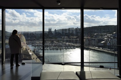 France, Seine Maritime, Pays de Caux, Cote d'Albatre, Fecamp, Les Pecheries (Fishery) - Museum of Fecamp is overlooking St. Stephen's Church and the port in the background