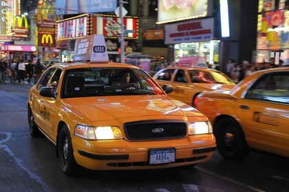 United States, New York, Manhattan, Theater district on Broadway Avenue, yellow cab in Times Square