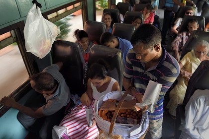 Sri Lanka, Southern Province, train from Galle to Colombo, fried shrimps and wade street vendor
