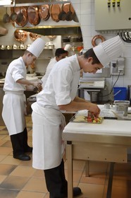 France, Rhone, Collonges au Mont d'Or, Paul Bocuse Restaurant L'Auberge du Pont de Collonges, three Michelin stars since 1965, the Paul Bocuse kitchen brigade at work