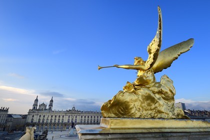 France, Meurthe-et-Moselle, Nancy, Place Stanislas (former Place Royale) built by Stanislas Leszczynski in the 18th century, listed as World Heritage by UNESCO, statue on the Triumph Arch (Here Gate), the City Hall and the Cathedral in the background