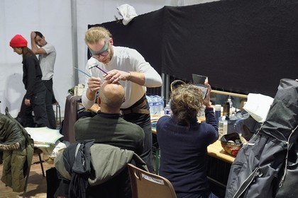 France, Meurthe-et-Moselle, Nancy, preparations for the parade of Saint-Nicolas place Carnot, make-up session for the Company Remue Ménage