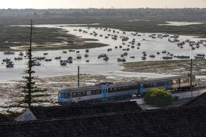 Portugal, Algarve, Faro, the old town, the Algarve railway line (Linha do Algarve) which connects the city of Lagos to that of Vila Real de Santo Antonio on the edge of the Ria Formosa Natural Park