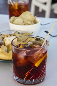 Italy, Liguria, village of Levanto north of the Cinque Terre, a glass of Campari as an aperitif
