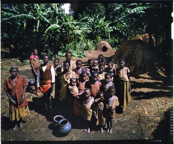 Burundi, Muyinga Province, Twa or Batwa (pygmies) potters, their habitat is generally very poor like here straw huts, the pots (inkono) are modeled in clay by hand on a shard of old pot by the technique of coiling, after being smoothed, a drawing is printed using a stick or a braided cord being rolled on the surface of the pot, when the pots are dry after several days, they are briefly cooked in a fire of sticks and grass but the ashes of the cooking should appear on sale in order to prove that the pot was never used by the Twa because nobody would want it (4x5 reversal film reproduction)