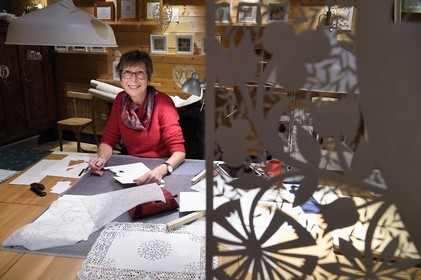 France, Bas Rhin, Bischwiller, the image maker Michèle Wagner has revived the papercutting (canivet) or the art of cut paper to stylize Christmas decorations in particular