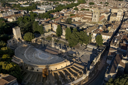 France, Bouches du Rhone, Arles, the roman theatre of the 1st century BC and the Saint-Trophime Cathedral, listed as World heritage by UNESCO (aerial view)