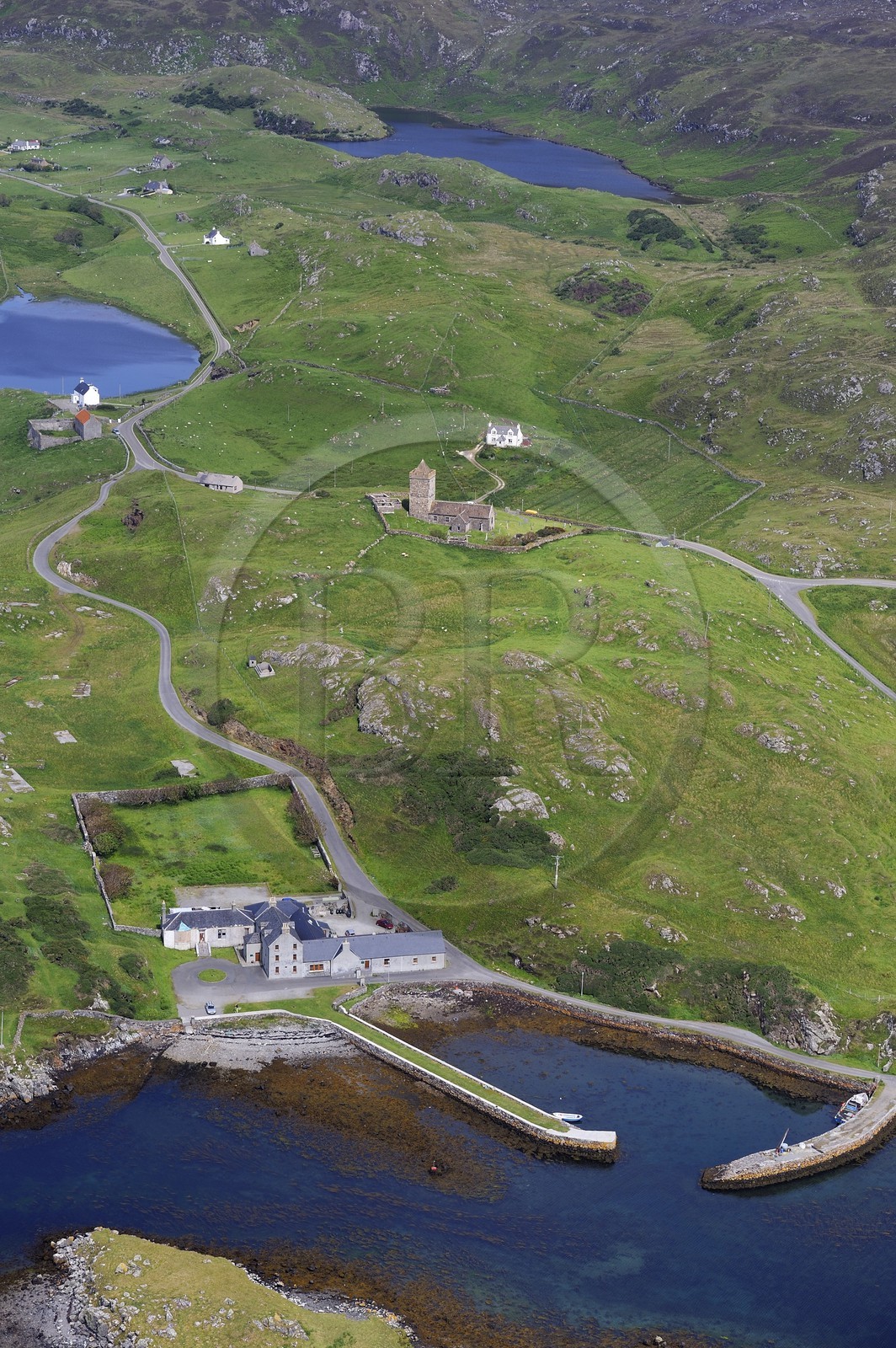 United Kingdom, Scotland, Outer Hebrides, Lewis and Harris Island, South Harris, Rodel, medieval church and small harbor (aerial view)