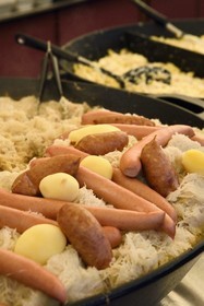 France, Bas Rhin, Strasbourg, old town listed as World Heritage by UNESCO, Christmas market (Christkindelsmarik) in Place Broglie, sale of sauerkraut to take away