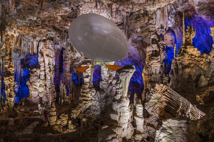 France, Gard, Mejannes-le-Clap, grotte de La Salamandre (Salamander cave), discovery of the cave in Aéroplume®, an individual dirigible balloon inflated with helium which allows you to fly away by flapping your wings