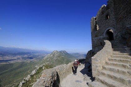France, Aude, Cathar castle of Queribus, in front of Maury plain and the Pyrenees