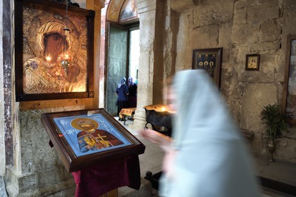 Georgia, Imereti, Kutaisi, Gelati Monastery, listed as World heritage by UNESCO, prayers to the Saints