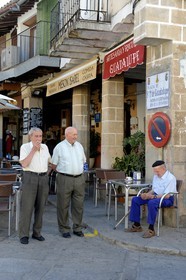 Spain, Extremadura, Guadalupe, men of the village on the place Saint Mary of Guadalupe