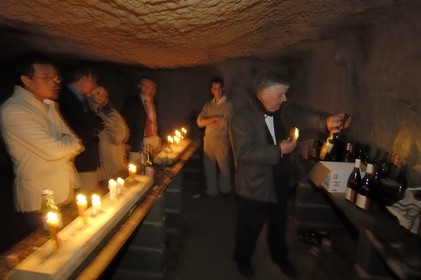 France, Indre et Loire, Chinon, Caves Painctes, wine growers brotherhood, informal wine tasting in the old quarries