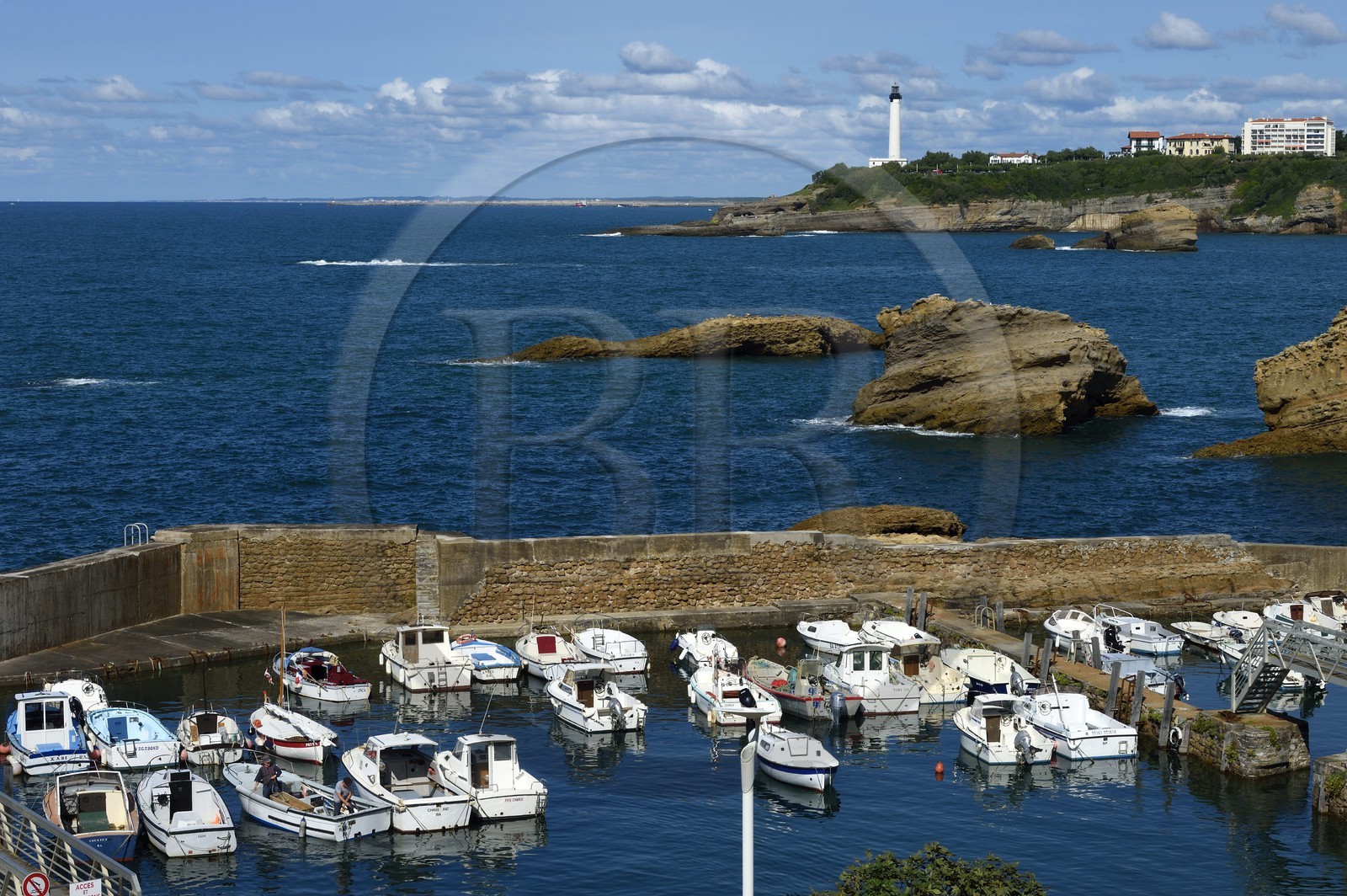France, Pyrenees Atlantiques, Basque Country, Biarritz, Port des Pecheurs, the lighthouse in the background