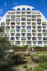 France, Herault, La Grande-Motte, labeled 20th century heritage, Couchant (setting sun) district west of the port, Le Poseidon building by architects Gilles and Jean Balladur, belonging to the so called bishops bonnet female architectural style