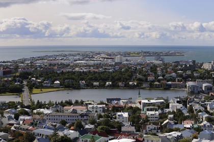 Iceland, Reykjavik, the City Hall (right) on Lake Tjörnin