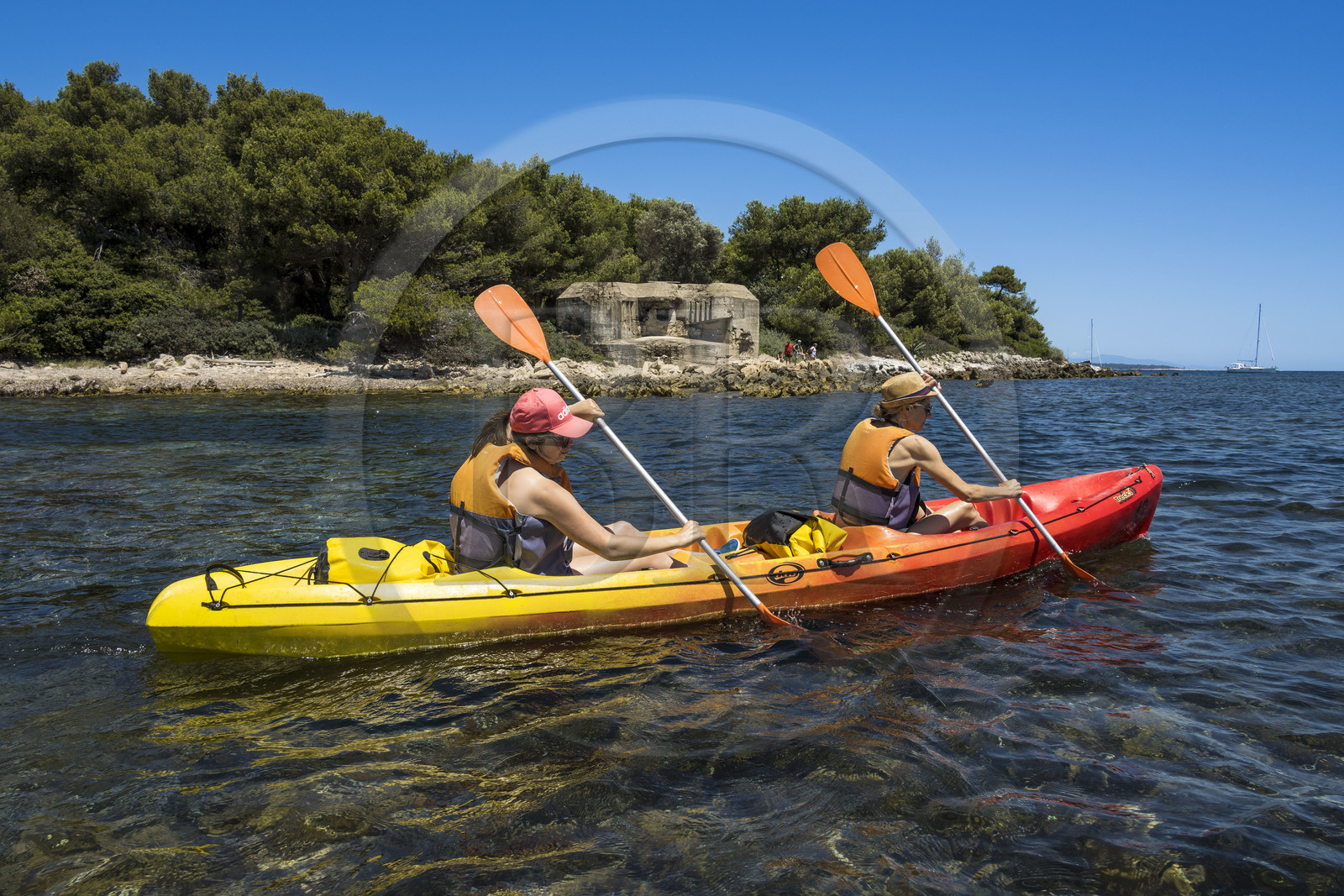 France, Alpes-Maritimes, Cannes, kayaking in the Lerins Islands, tour of the Saint-Honorat island from the south, bunker dating from the second world war in the background