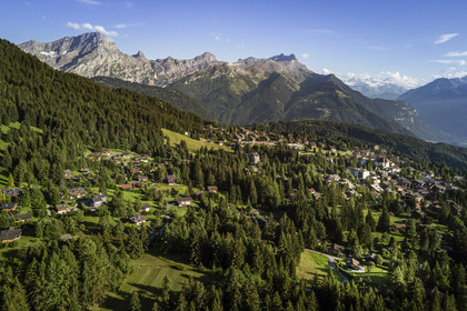 Switzerland, Canton of Vaud, Villars-sur-Ollon and the massif of Argentine in the background (aerial view)