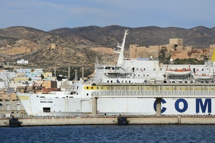 Spain, Andalusia, Almeria, ferry to Algeria in the port and the Alcazaba fortress in the background