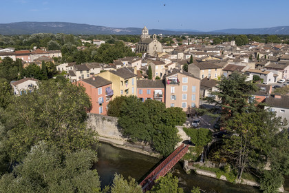 France, Vaucluse, Le Thor, bridge over the Sorgue river and Notre-Dame-du-Lac church (aerial view)