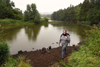 France, Puy de Dome, Aydat, towards the pond of Chateau de Montlosier, Catline Lajoie nature warden at the Parc Naturel Régional des Volcans d'Auvergne (regional nature park of Auvergne volcanoes)