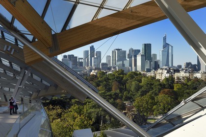 France, Paris, Louis Vuitton Foundation by architect Frank Gehry and La Defense in the background