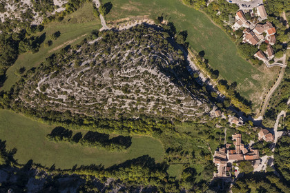 France, Herault, the Causses and the Cevennes, Mediterranean agro pastoral cultural landscape, listed as World Heritage by UNESCO, Saint Maurice Navacelles, Cirque de Navacelles, the rock of the Virgin is surrounded by a oxbow of the river La Vis (aerial view)