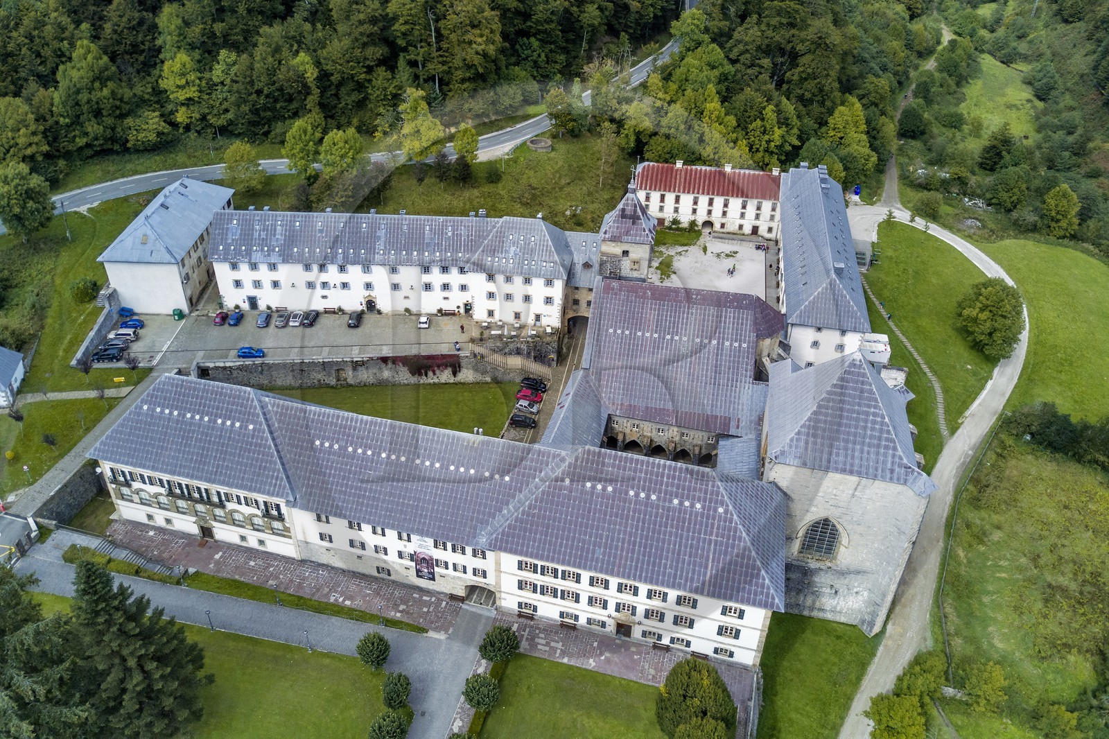 Spain, Basque Country, Navarra, Roncesvalles, stop on the Camino de Santiago (the Way of St. James), Royal Collegiate Church of Roncesvalles (aerial view)