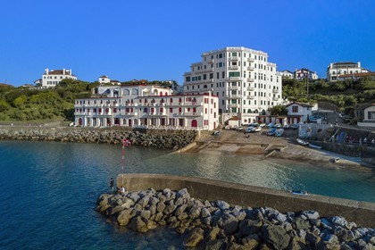 France, Pyrenees Atlantiques, Basque Country coast, Guethary, old whaling port overlooked by the former art deco Guétharia hotel built in the 1920s turned into a residence (aerial view)