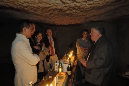 France, Indre et Loire, Chinon, Caves Painctes, wine growers brotherhood, informal wine tasting in the old quarries