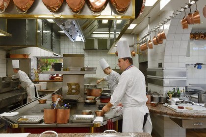 France, Rhone, Collonges au Mont d'Or, Paul Bocuse Restaurant L'Auberge du Pont de Collonges, three Michelin stars since 1965, the Paul Bocuse kitchen brigade run by chef Christophe Muller at work