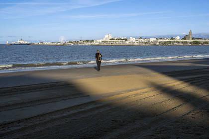 France, Charente-Maritime, Royan, Grande-Conche beach with the Notre-Dame de Royan church in the background