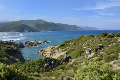France, Haute Corse, Nebbio, Agriates Desert, Peraiola Cove, riders on the East of Ostriconi beach